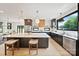 Large kitchen with stainless steel appliances, a central island, and great natural light, perfect for cooking at 309 Sain Rd, Statesville, NC 28625