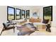 Inviting living room with large windows, stylish seating, and ample natural light at 309 Sain Rd, Statesville, NC 28625