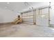 Open garage featuring doors with window inserts for ample natural light at 3601 Woody Grove Ln, Charlotte, NC 28210