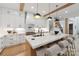 Stylish kitchen features an island with seating, custom cabinets, and a professional-grade range at 3601 Woody Grove Ln, Charlotte, NC 28210