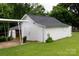 A quaint detached garage with a dark roof, providing ample storage space and potential for a workshop at 441 Jackson St, Rock Hill, SC 29730
