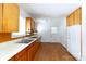 Functional kitchen with wood cabinets, laminate countertops, and ample storage at 441 Jackson St, Rock Hill, SC 29730