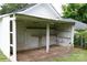 Outdoor shed featuring corrugated metal roofing, offering versatile storage solutions and a functional outdoor workspace at 441 Jackson St, Rock Hill, SC 29730