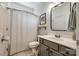 Neutral bathroom featuring wallpaper, a single sink vanity, and a shower with curtain at 4712 Amberside Dr, Rock Hill, SC 29732