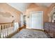 Lovely Bedroom with closet, large window, and comfortable furnishings offers a cozy retreat at 4712 Amberside Dr, Rock Hill, SC 29732