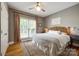 Cozy bedroom with natural light, neutral walls, and a large decorative rug at 4712 Amberside Dr, Rock Hill, SC 29732