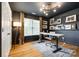 Stylish home office with large window, modern lighting, and decor creates an inspiring workspace at 4712 Amberside Dr, Rock Hill, SC 29732
