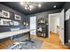 Well-appointed home office with decor, natural light, and modern furnishings creates an inspiring work environment at 4712 Amberside Dr, Rock Hill, SC 29732