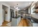 This spacious kitchen features a central island, stainless steel appliances, and beautiful countertops and cabinetry at 4712 Amberside Dr, Rock Hill, SC 29732