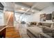 Open-concept living area with hardwood floors, natural light, and a comfortable sectional at 4712 Amberside Dr, Rock Hill, SC 29732