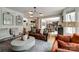 Open-concept living area with hardwood floors and views into dining room and kitchen at 4712 Amberside Dr, Rock Hill, SC 29732