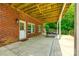 Spacious covered patio area with a concrete floor, seating area, and view of the backyard at 4712 Amberside Dr, Rock Hill, SC 29732