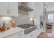 Contemporary kitchen featuring modern appliances and stylish backsplash at 5060 Harrowsmith Ln, Charlotte, NC 28204