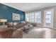 Inviting living room with a comfortable leather sofa and stylish decor at 5060 Harrowsmith Ln, Charlotte, NC 28204