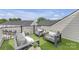 Rooftop deck with comfortable seating and artificial grass at 5060 Harrowsmith Ln, Charlotte, NC 28204
