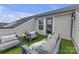 Rooftop deck with comfortable seating, turf, and access to the home at 5060 Harrowsmith Ln, Charlotte, NC 28204