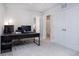 Bright bedroom space with a desk setup and a view into the bathroom at 512 Morrows Turnout Way, Pineville, NC 28134
