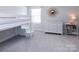 bedroom with bunkbed, carpeted floor, dresser and decoratively designed with a large mirror at 512 Morrows Turnout Way, Pineville, NC 28134
