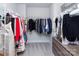 Walk-in closet providing optimal storage with rows of hanging clothes and shelves at 512 Morrows Turnout Way, Pineville, NC 28134
