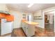 Spacious kitchen with orange countertops and vintage cabinets at 520 Eastwood Park Cir, Albemarle, NC 28001