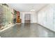 Spacious living room featuring a decorative mural, large windows and view to another room at 520 Eastwood Park Cir, Albemarle, NC 28001