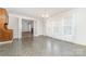 Bright living room with natural light, chandelier, built-in cabinet and view of another room at 520 Eastwood Park Cir, Albemarle, NC 28001