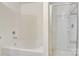 Bathroom featuring a large soaking tub and a walk-in shower at 5311 Oakdale Ridge Rd, Charlotte, NC 28216