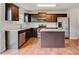 Kitchen features stainless steel appliances, central island, and white subway tile backsplash at 5311 Oakdale Ridge Rd, Charlotte, NC 28216