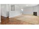 Inviting living room featuring a fireplace, hardwood floors, and cozy atmosphere at 5311 Oakdale Ridge Rd, Charlotte, NC 28216