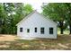 The backyard has a newly installed patio area and freshly laid sod, perfect for outdoor entertaining at 617 English St, Monroe, NC 28110