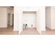 Spacious laundry room features wood-look flooring and white paint at 617 English St, Monroe, NC 28110