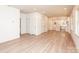 Spacious open-concept living area with modern flooring and plenty of natural light flowing into the kitchen at 617 English St, Monroe, NC 28110
