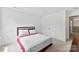 Bedroom featuring carpet, a bed with a white and red quilt and double door closet at 6229 Sid Crane Dr, Charlotte, NC 28216