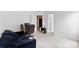 Bedroom features a sitting area, desk, neutral wall-to-wall carpet and an ensuite at 6229 Sid Crane Dr, Charlotte, NC 28216