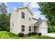 Charming two-story home featuring a well-maintained lawn and a two-car garage at 6229 Sid Crane Dr, Charlotte, NC 28216