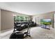 Spacious living room features comfortable seating, an entertainment center, and natural light at 6229 Sid Crane Dr, Charlotte, NC 28216