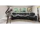 Comfortable seating in this spacious living room with great natural light at 6229 Sid Crane Dr, Charlotte, NC 28216