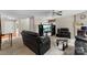 Inviting living room featuring neutral colors, a fireplace, and entertainment center at 6229 Sid Crane Dr, Charlotte, NC 28216