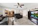 Comfortable living room with modern furniture and an open view to the kitchen and dining area at 6229 Sid Crane Dr, Charlotte, NC 28216