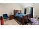 Comfortable main bedroom with neutral paint, a vaulted ceiling, and a dark rug at 6229 Sid Crane Dr, Charlotte, NC 28216