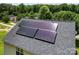 Home's solar panels atop the roof at 6229 Sid Crane Dr, Charlotte, NC 28216