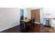 This dining room features hardwood floors, a chandelier, and a table with seating for four at 679 Cape Fear St, Fort Mill, SC 29715
