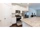 Well-equipped kitchen with stainless steel appliances and a large island at 679 Cape Fear St, Fort Mill, SC 29715