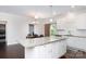 Bright and airy kitchen with an island and dining area at 679 Cape Fear St, Fort Mill, SC 29715
