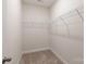 This walk-in closet features carpeted floors and metal shelving at 679 Cape Fear St, Fort Mill, SC 29715