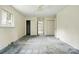Bright bedroom with large closets, a doorway, carpet, and natural light at 6900 Ridge Lane Rd, Charlotte, NC 28262
