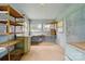 Open storage area with large windows, sink and shelving at 6900 Ridge Lane Rd, Charlotte, NC 28262