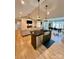 Bright and spacious kitchen with a central island that opens up to the living and dining room at 7133 Church Rd, Taylorsville, NC 28681