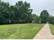 Outside recreational area with a volleyball court, green space, and playground at 727 Torrey Pines Ln, Fort Mill, SC 29715