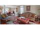 Ornate living room with hardwood floors and comfortable seating, perfect for entertaining at 8409 Olde Stonegate Ln, Mint Hill, NC 28227